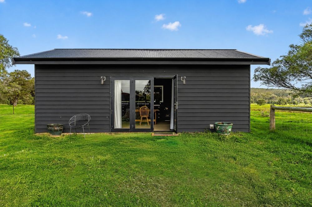 The doors open onto the lawn